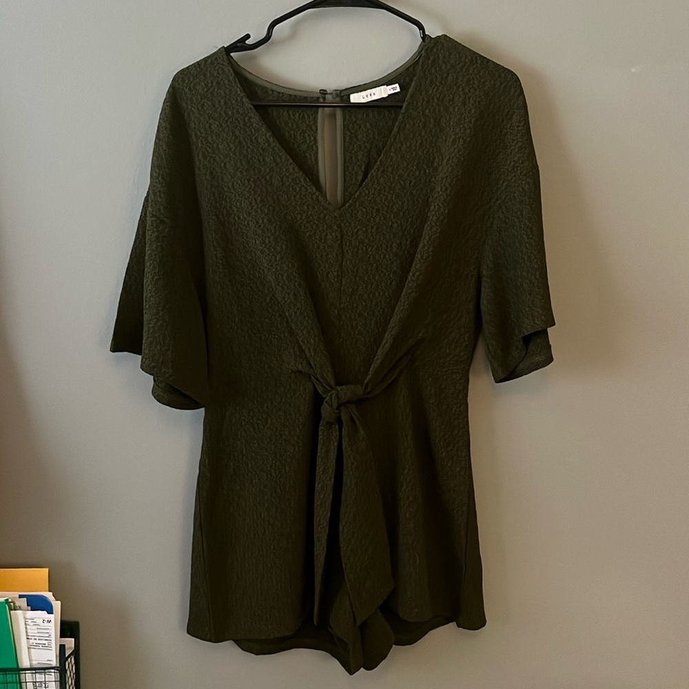 Olive green romper. Thick and beautiful material. Short sleeve.